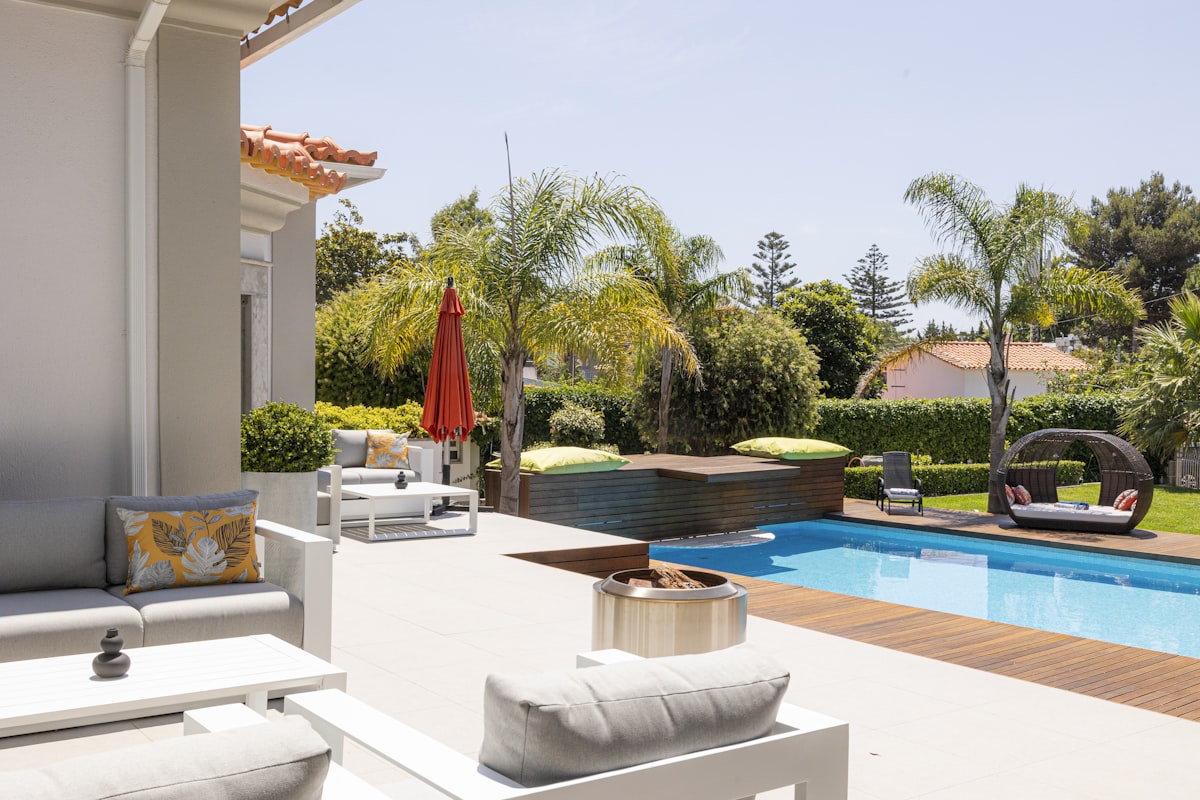 Resort-style pool surround with cool-to-the-touch turf that stays 30°F cooler than natural grass.