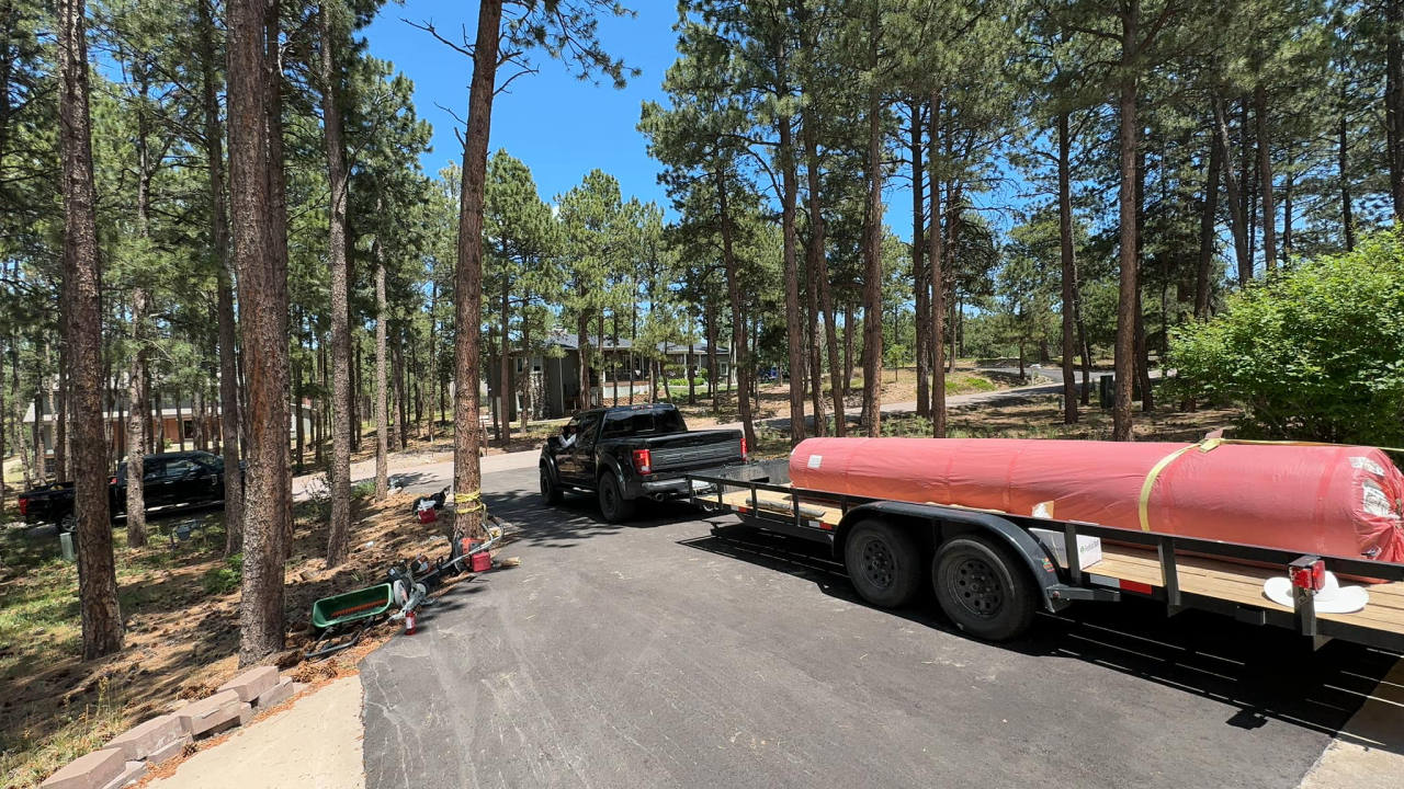 SantaCruz Landscaping crew and equipment on a Colorado job site — artificial turf in Parker, CO