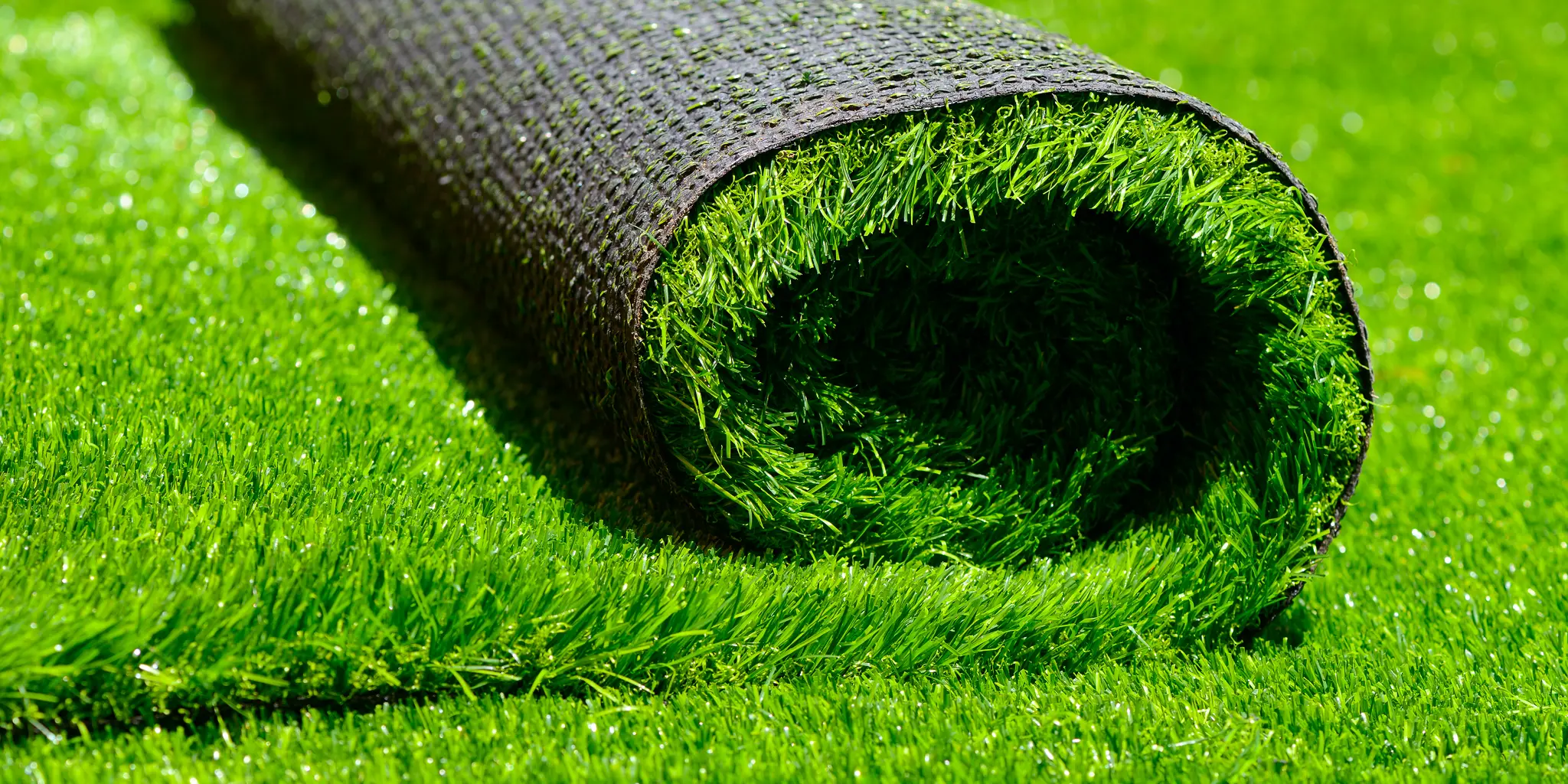 Professional artificial turf installation on a residential lawn in Parker